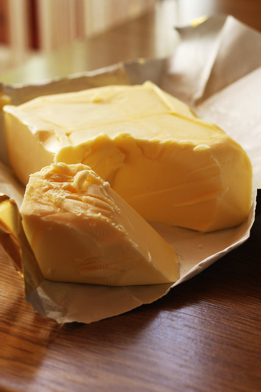 Image of large block of shea butter sitting on a table.